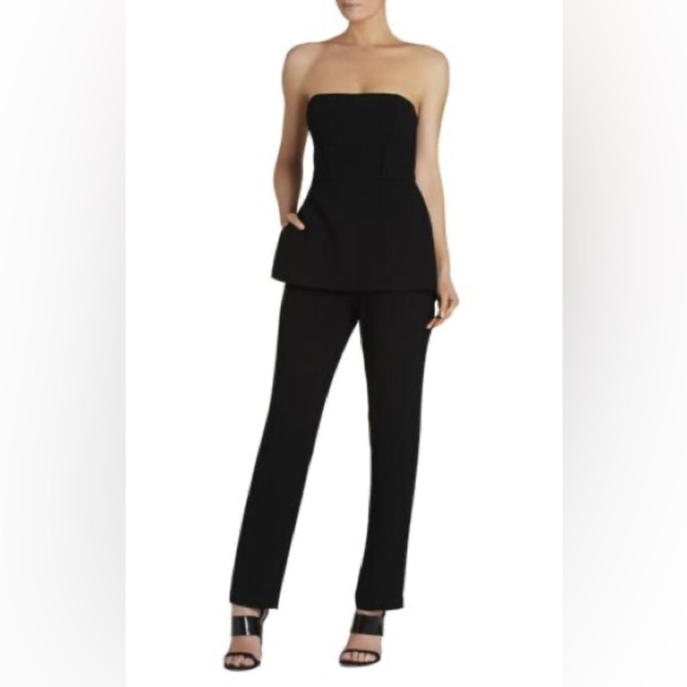 Get ready for your “little black dress” in flattering jumpsuit form with pockets